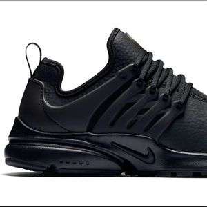 Black leather Nike shoes